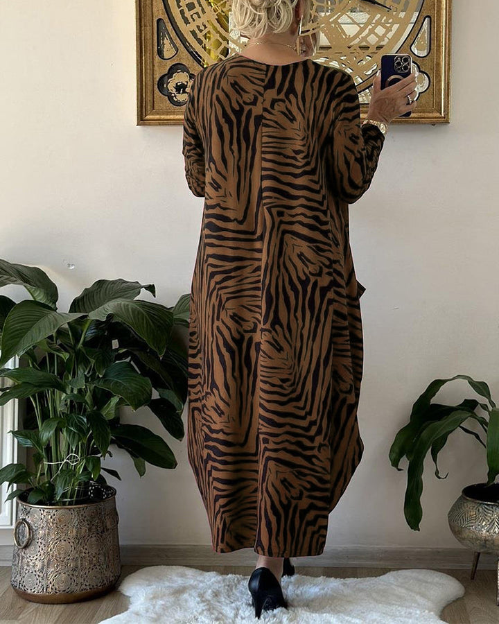 Leoparda raksta garā kleita