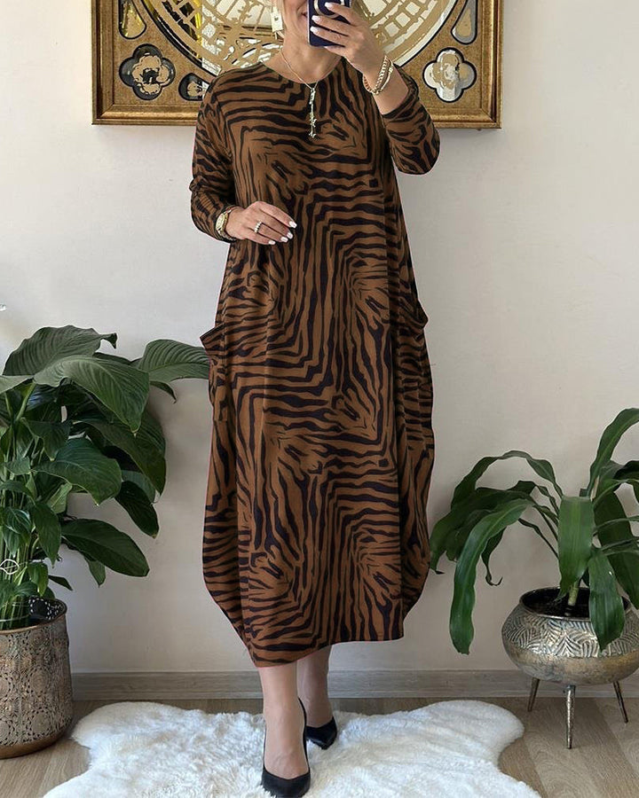 Leoparda raksta garā kleita