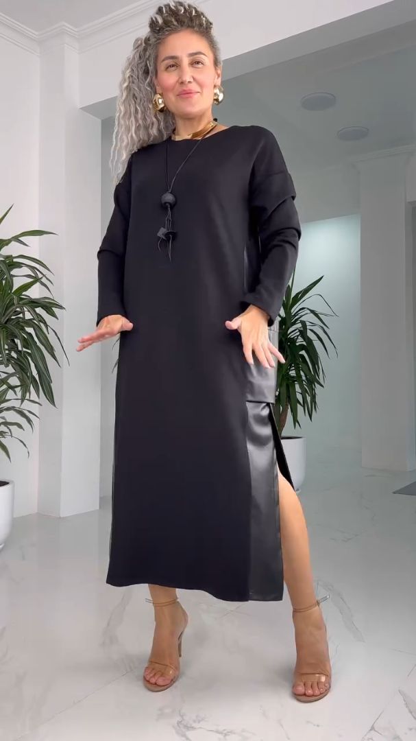 Skaista kleita ar ādas detaļām