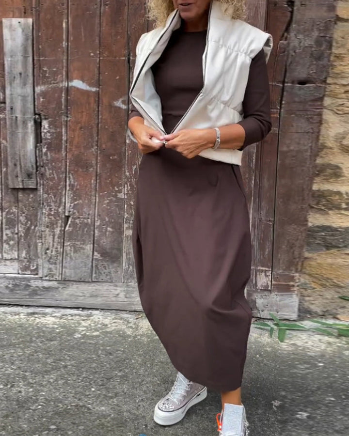 Eleganta vienkrāsaina kleita ar kabatām