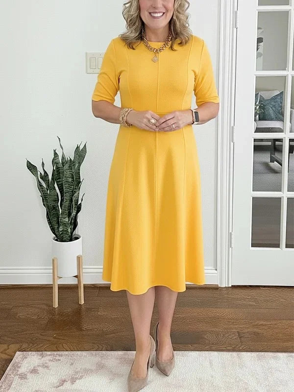 Vienkrāsaina midi kleita ar 3/4 piedurknēm