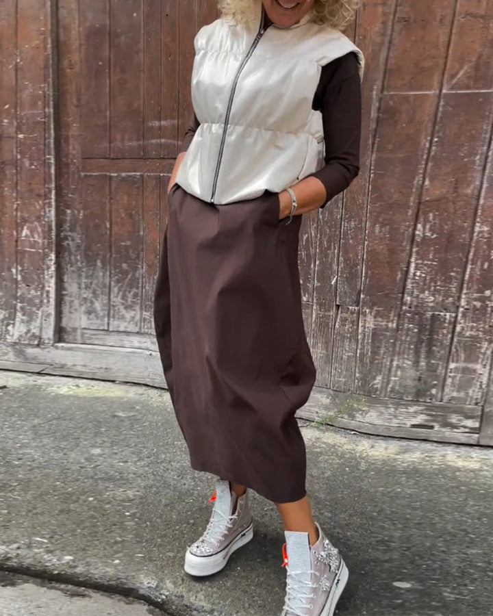 Eleganta vienkrāsaina kleita ar kabatām