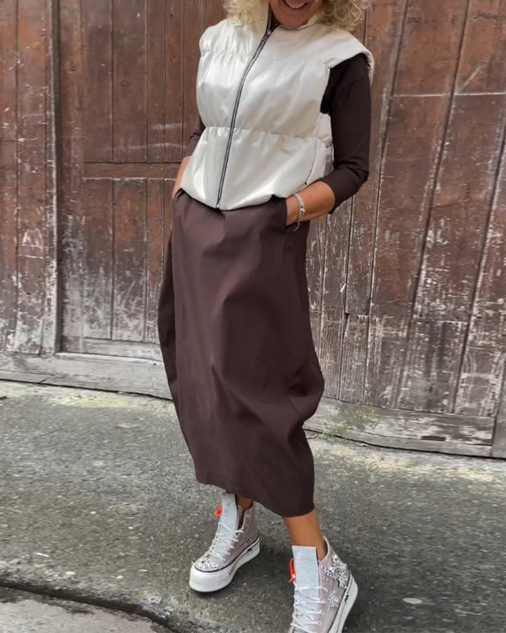 Eleganta vienkrāsaina kleita ar kabatām