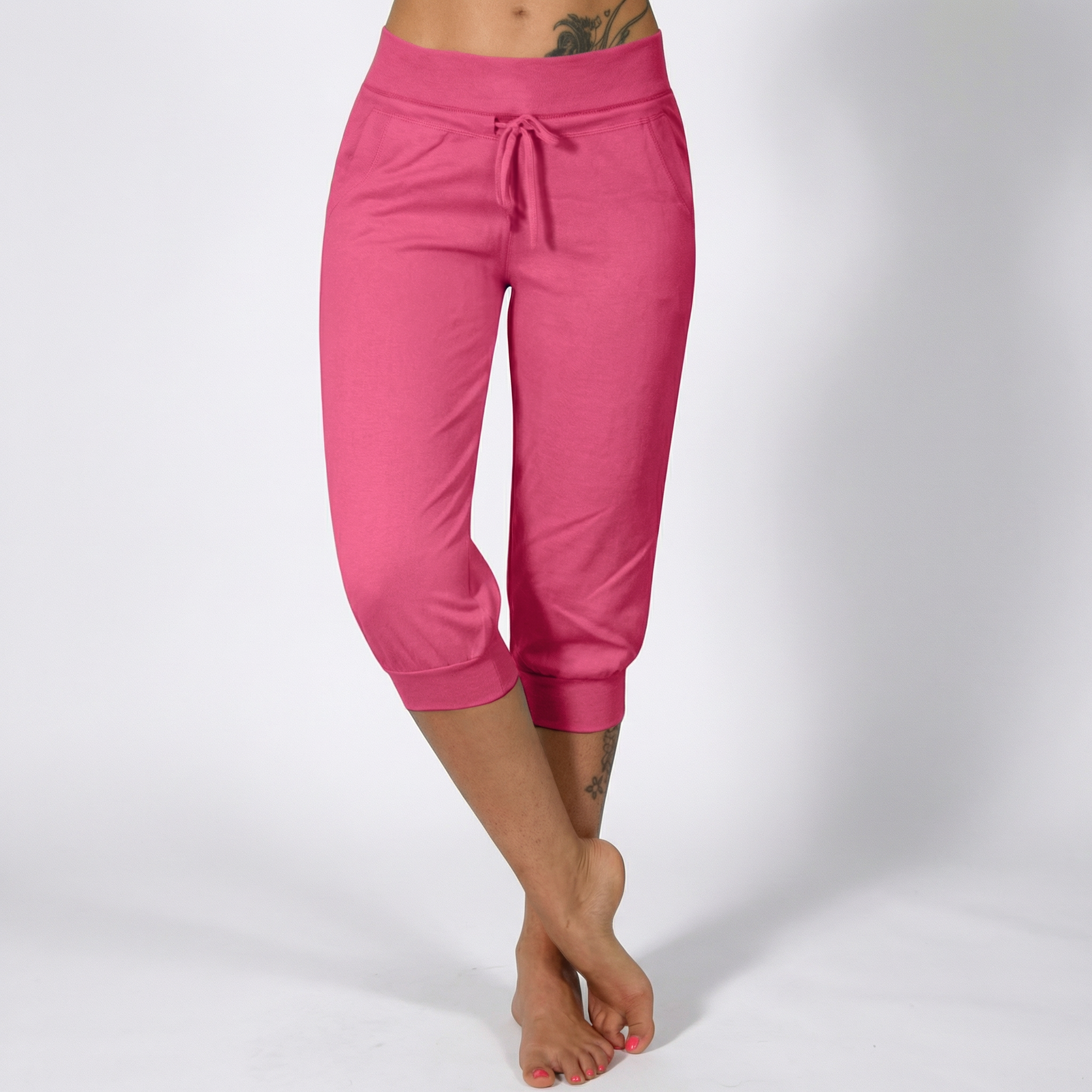 Īsas treniņbikses ar aukliņu jostasvietā